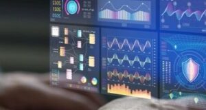 Person viewing colorful data dashboards with charts and analytics graphics